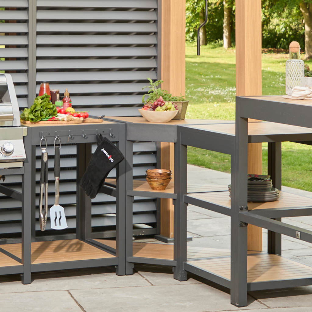 The Best Outdoor Kitchen Set-ups for Summer 2026 for Sustainable Brands The Best Outdoor Kitchen Set-ups for Summer 2026 for Sustainable Brands atkin and thyme savannah kitchen angled corner unit oak 1