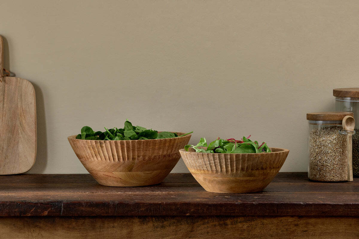 The Honest Nkuku Recycled Glassware Review: We Look At 10 Tumblers, Highballs and Gin Glasses mango wood bowls with scalloped edges and salad leaves in