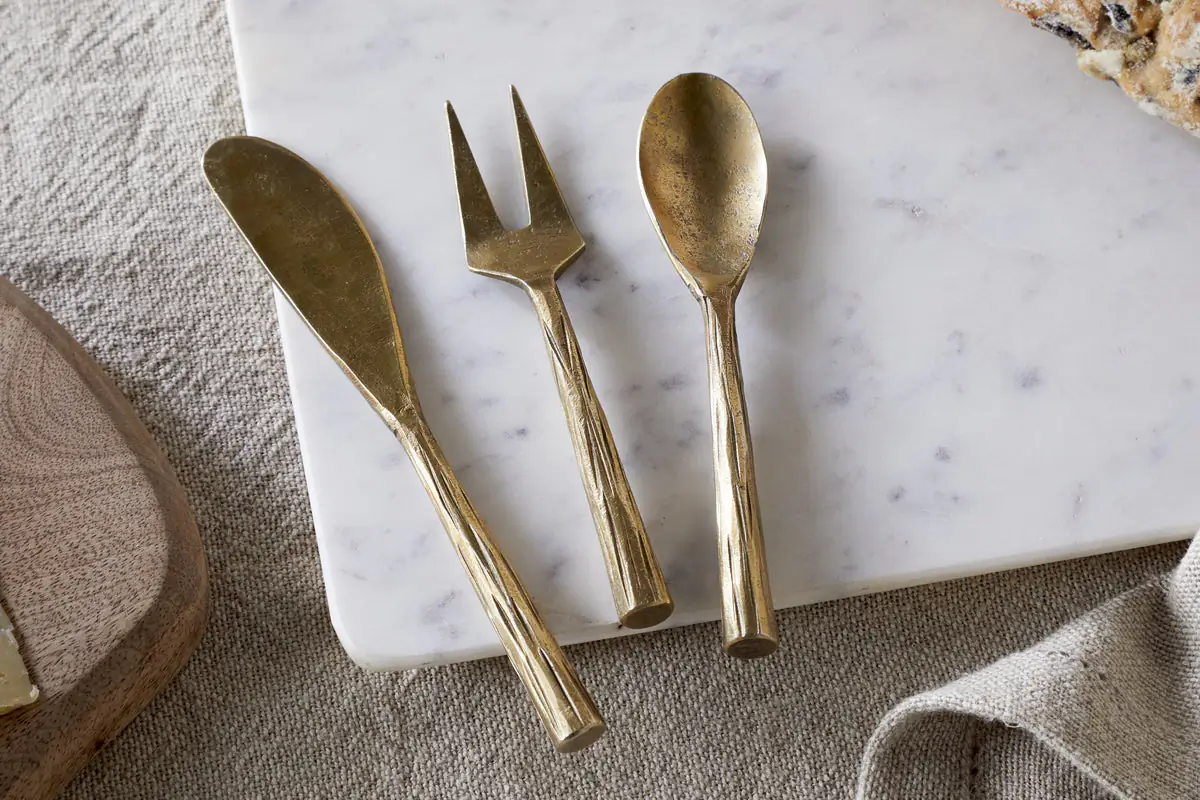 The Honest Nkuku Recycled Glassware Review: We Look At 10 Tumblers, Highballs and Gin Glasses antique brass serving set with knife fork and spoon