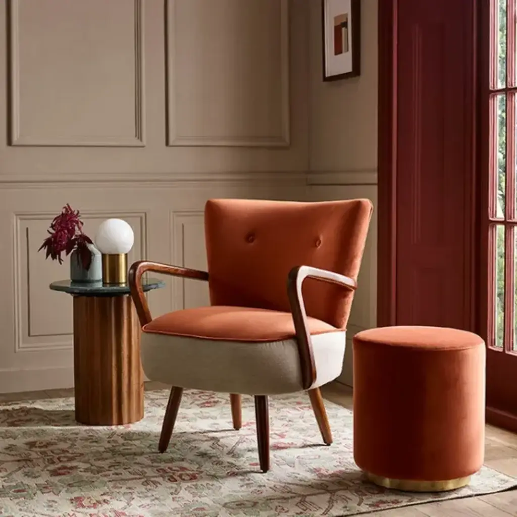 Calvin armchair in rust colour by atkin and thyme