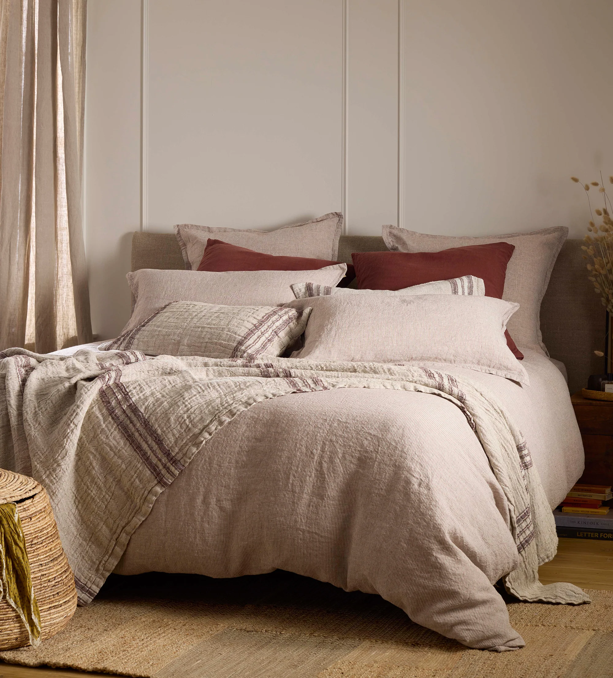 How to Create a Sustainable Bedroom: A Practical Guide Conker Sid Stripe 100% Linen Bed Linen with small narrow stripes in conker and white colour.