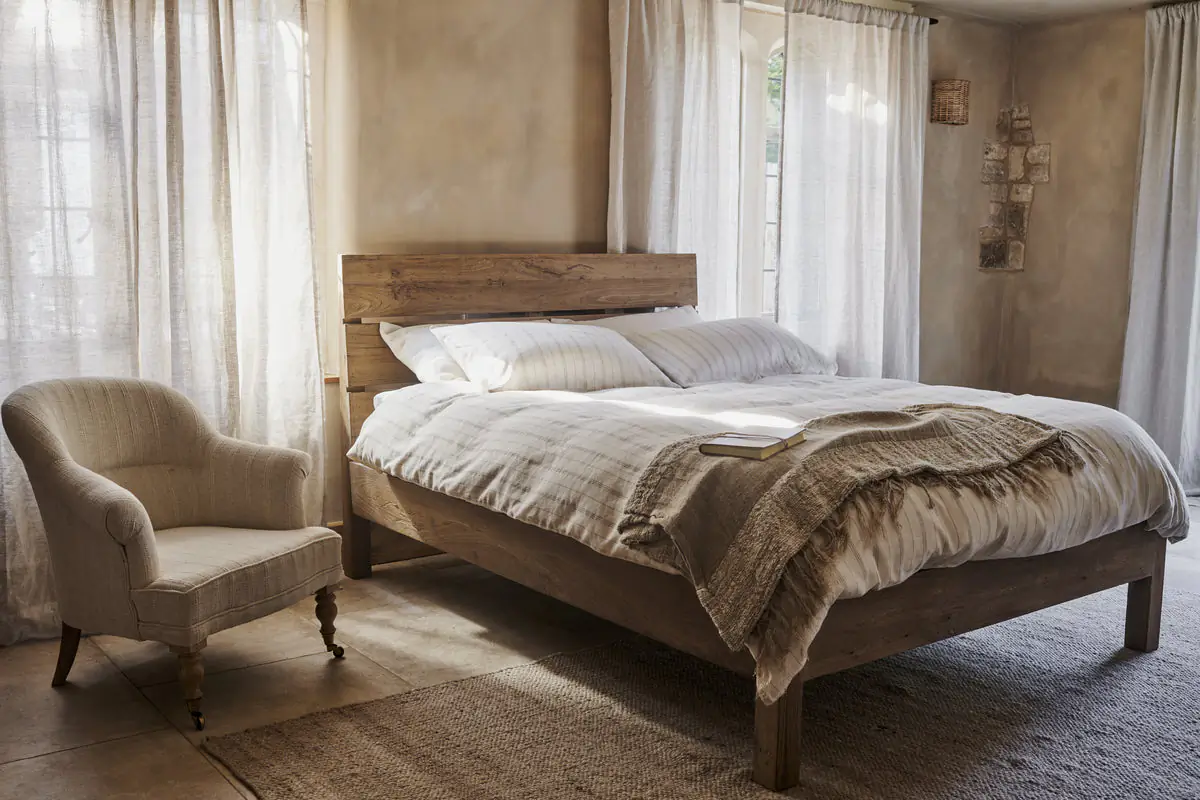 How to Create a Sustainable Bedroom: A Practical Guide Iya Reclaimed wood bed by Nkuku.