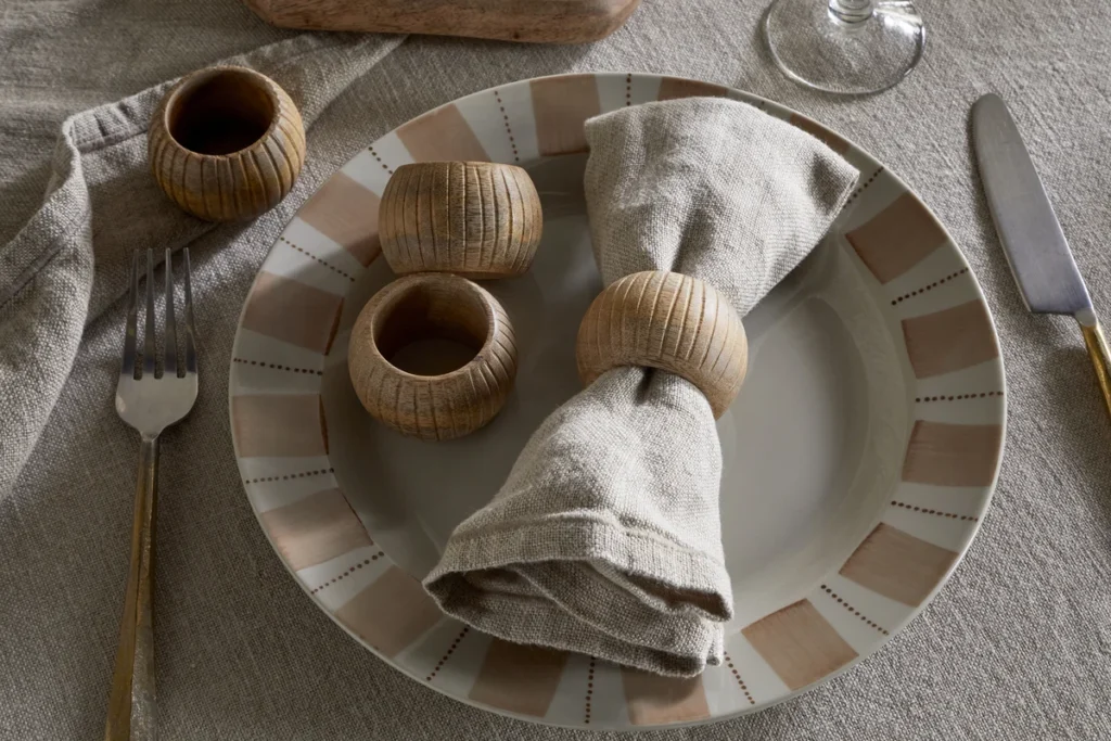 The Conscious Outdoor Living Edit 2026: How to Choose Sustainable Garden Furniture & Fire Pits NP58508 NP58635 Vivan Napkin Rings Natural Set of 4 nkuku 1