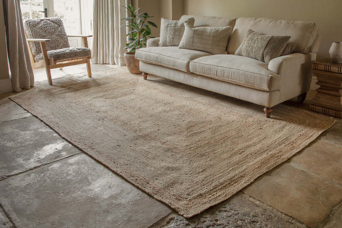 Braided Hemp Rug in extra large size from nkuku styled in an eco minimalism living room.