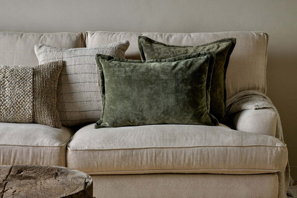 Pilani velvet and linen cushion cover in moss from Nkuku.