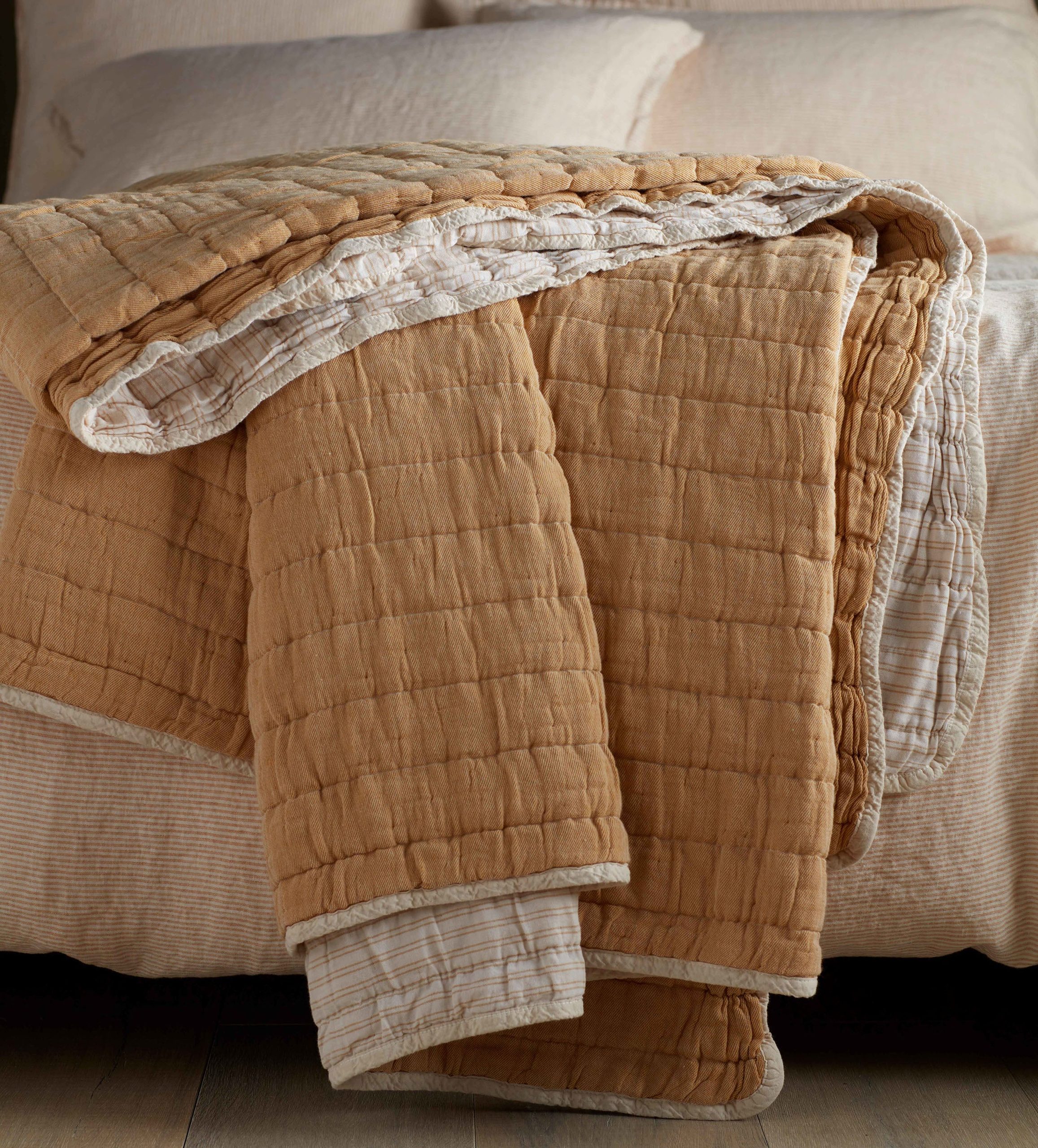 Yellow vivienne 100% cotton quilted throw from Secret Linen Store.
