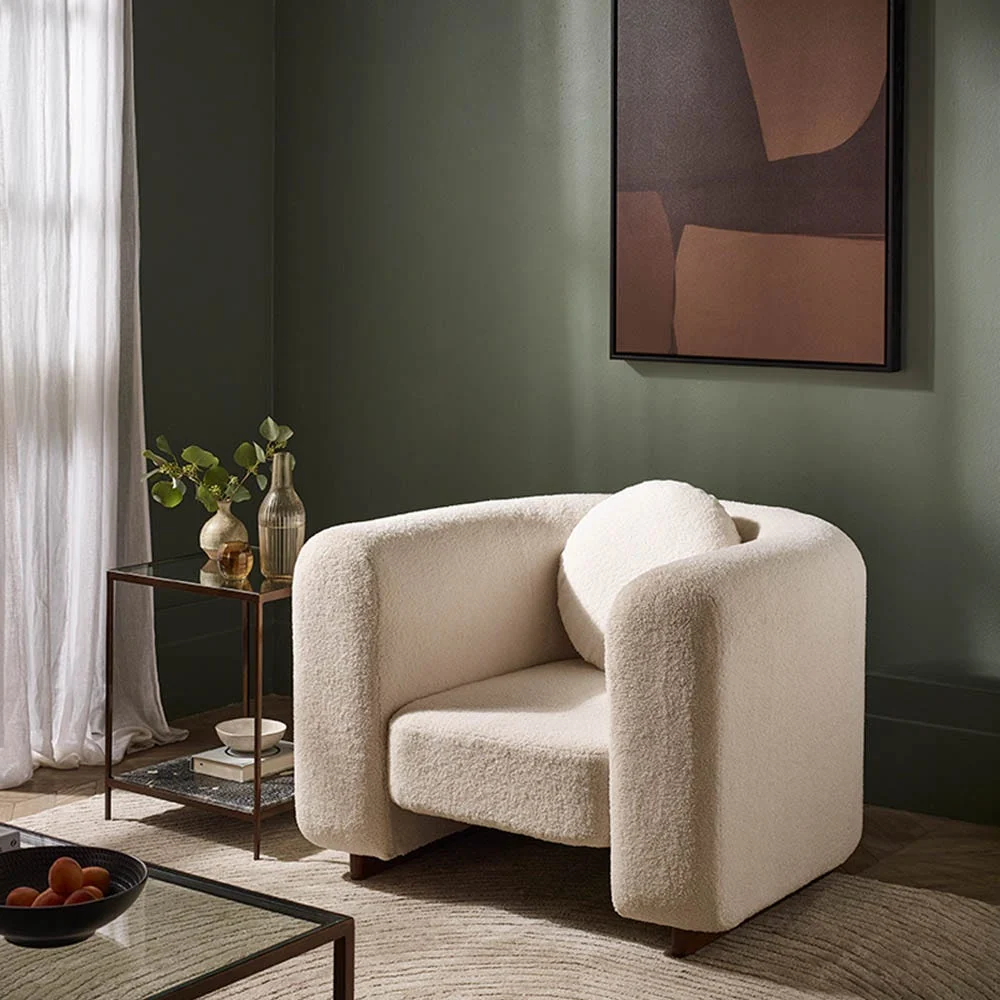 Bonnie Curved Armchair in boucle fabric by Atkin and thyme
