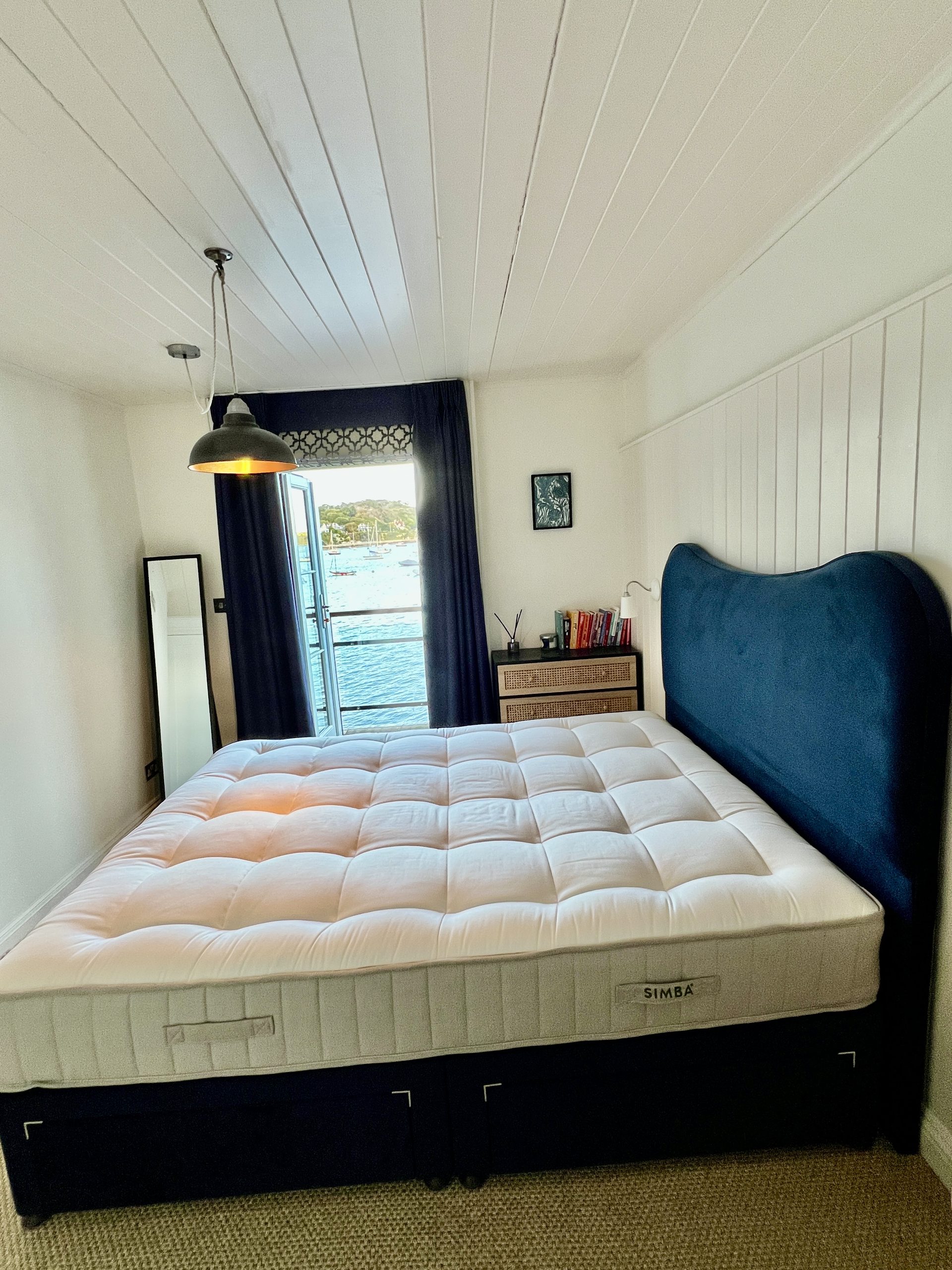 I Slept on the Simba Natural Hybrid Source Mattress for a Month: Here's My Honest Review Side view of the Kingsize of the Source mattress by Simba Sleep.