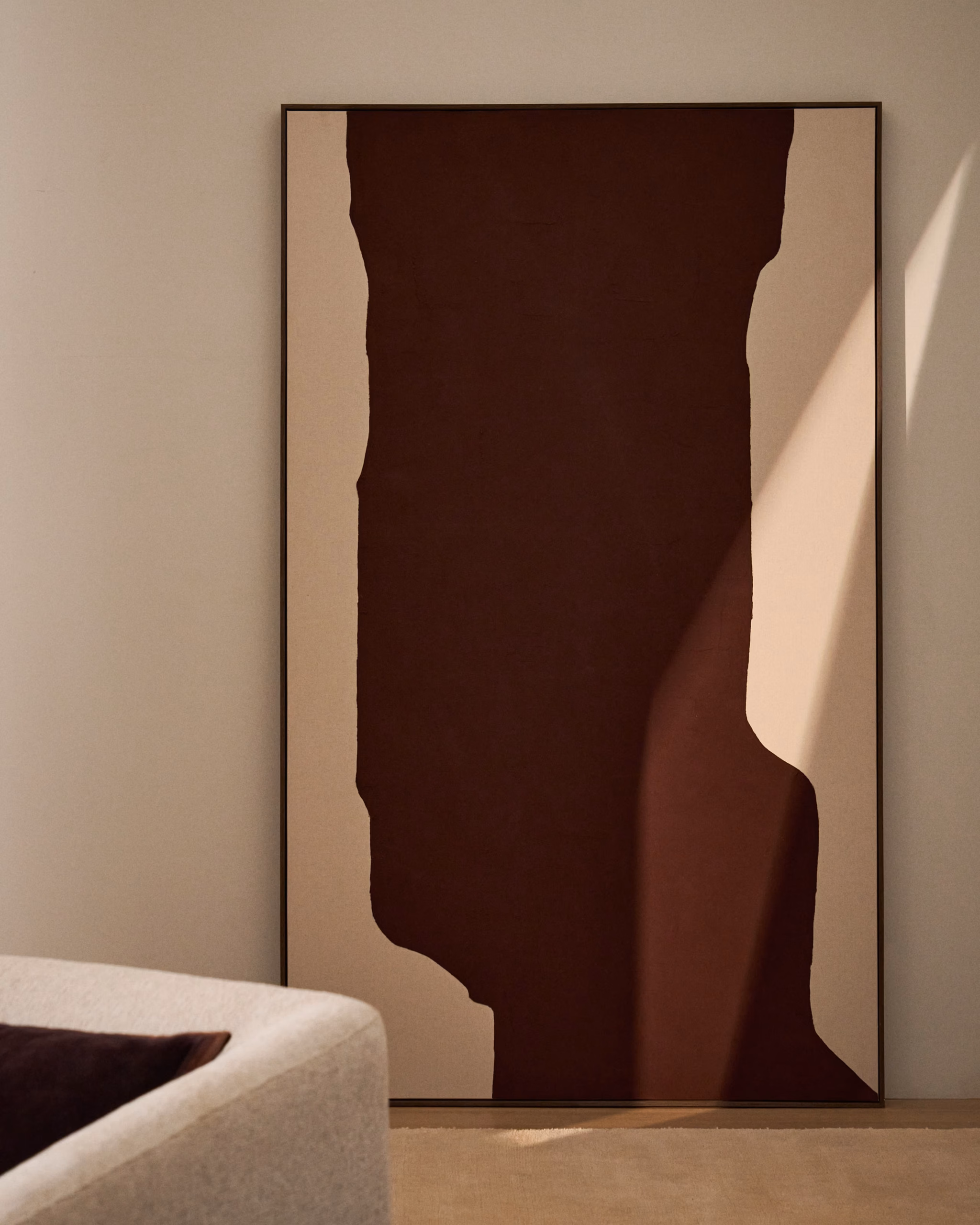 Autumn Winter Home Trends 2026: A Sustainable Edit Hand painted burgundy and ecru picture in a living room.