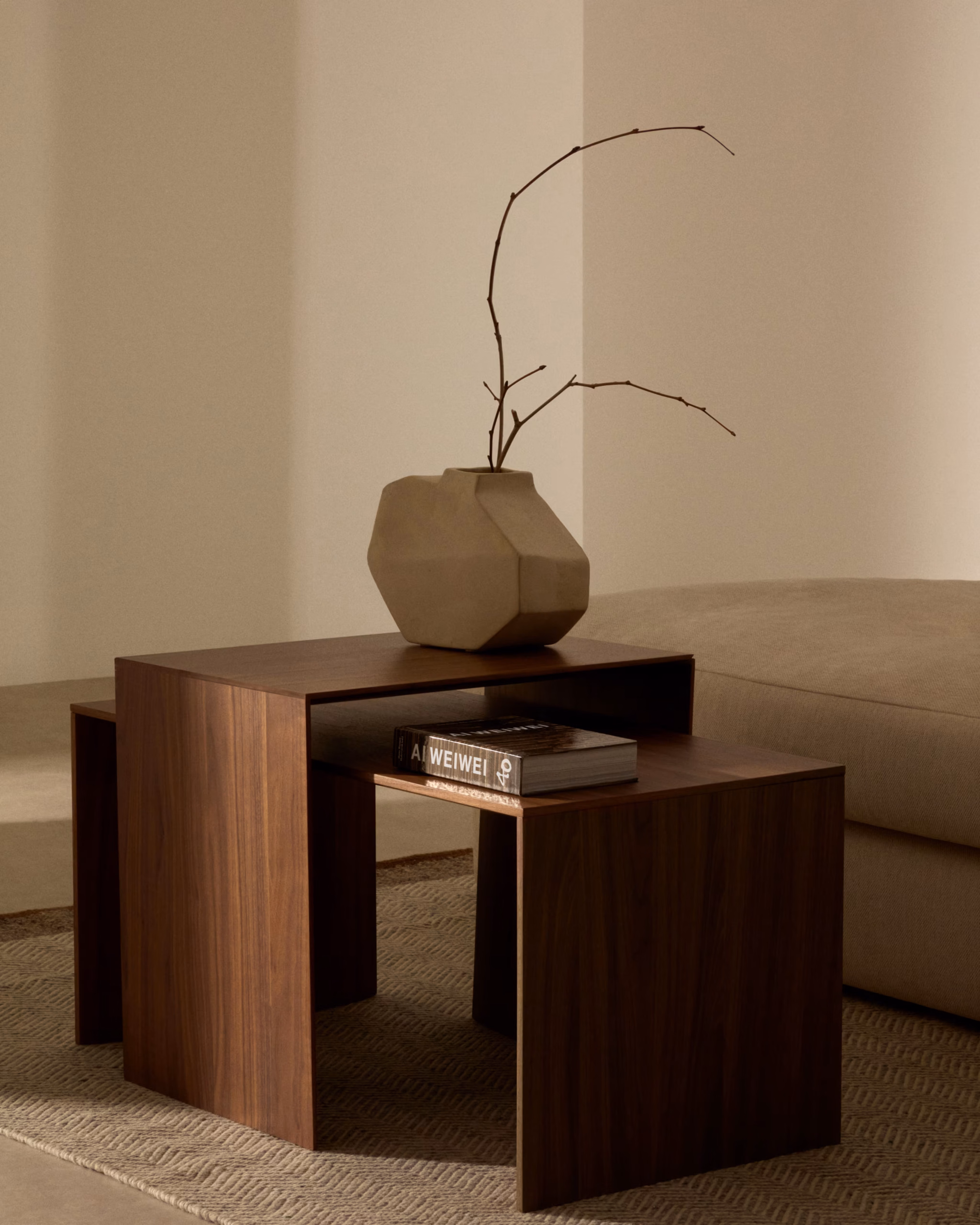 Autumn Winter Home Trends 2026: A Sustainable Edit Dark walnut stacking coffee tables in square pattern.