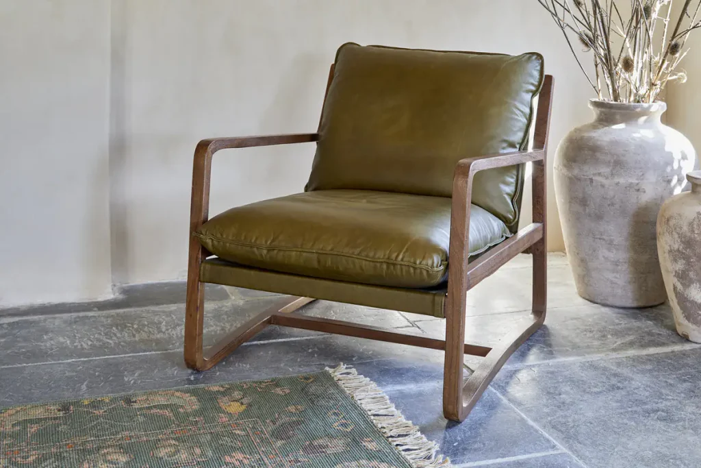 Autumn Winter Home Trends 2026: A Sustainable Edit Acacia Wood & Leather Occasional Chair in Olive Green.