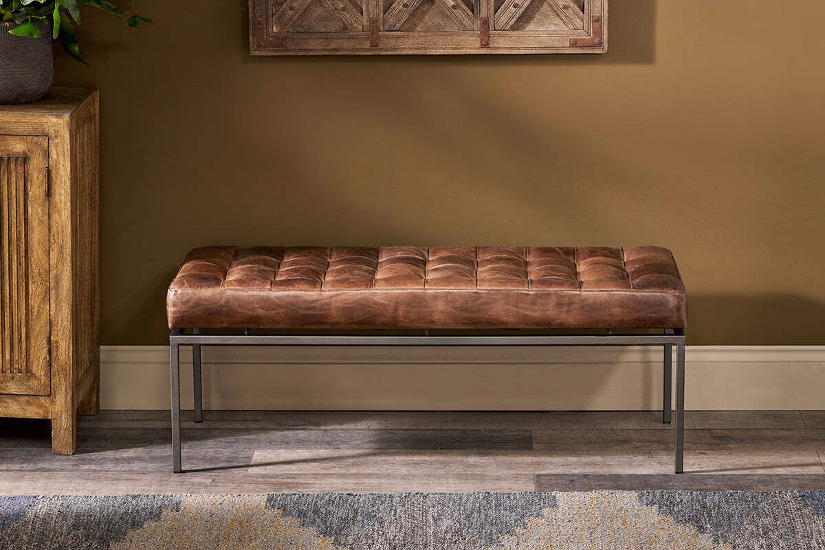 Autumn Winter Home Trends 2026: A Sustainable Edit Brown Leather Upholstered Bench with chrome legs and frame.