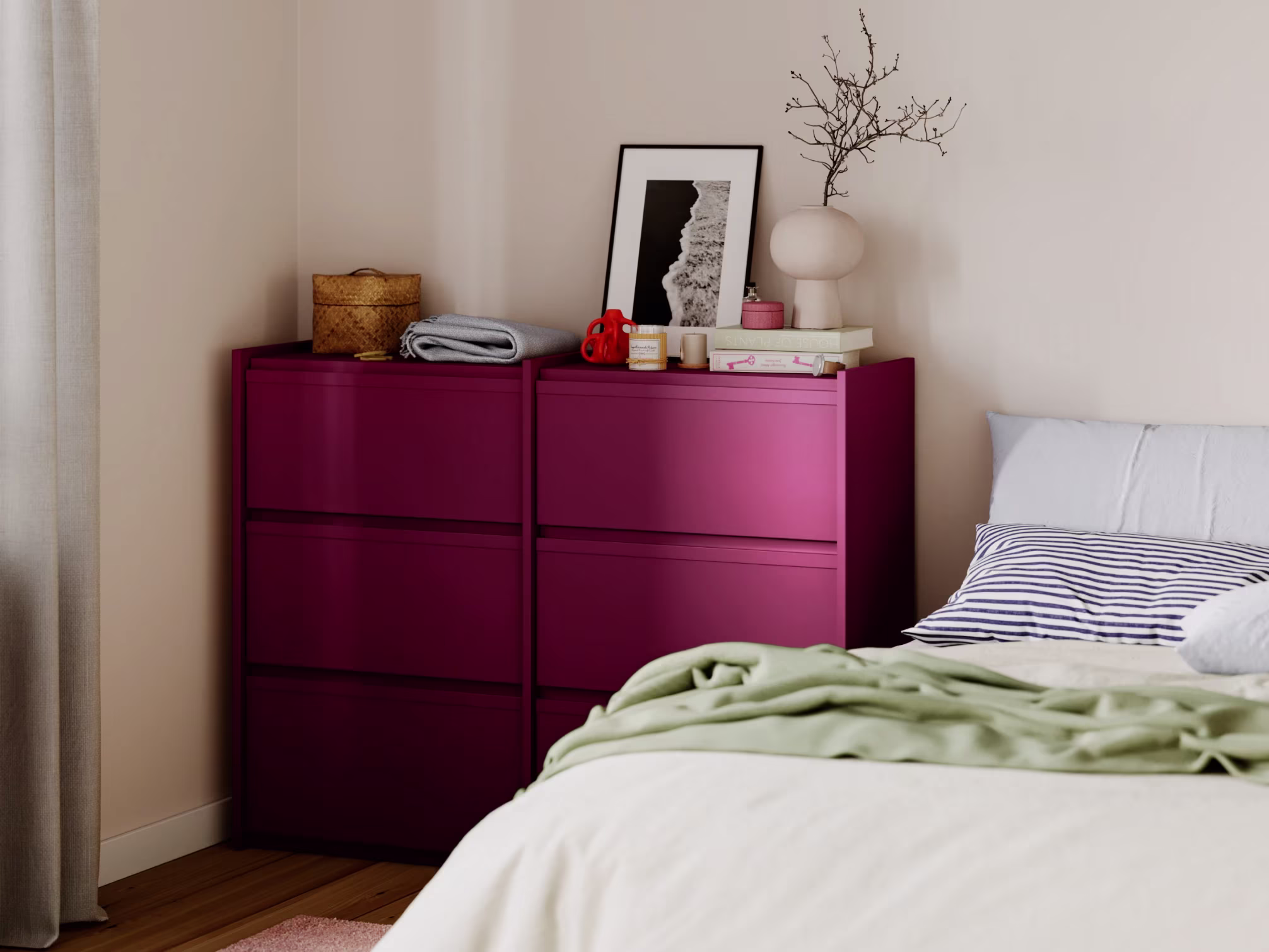 Autumn Winter Home Trends 2026: A Sustainable Edit Burgundy chest of drawers next to a bed.